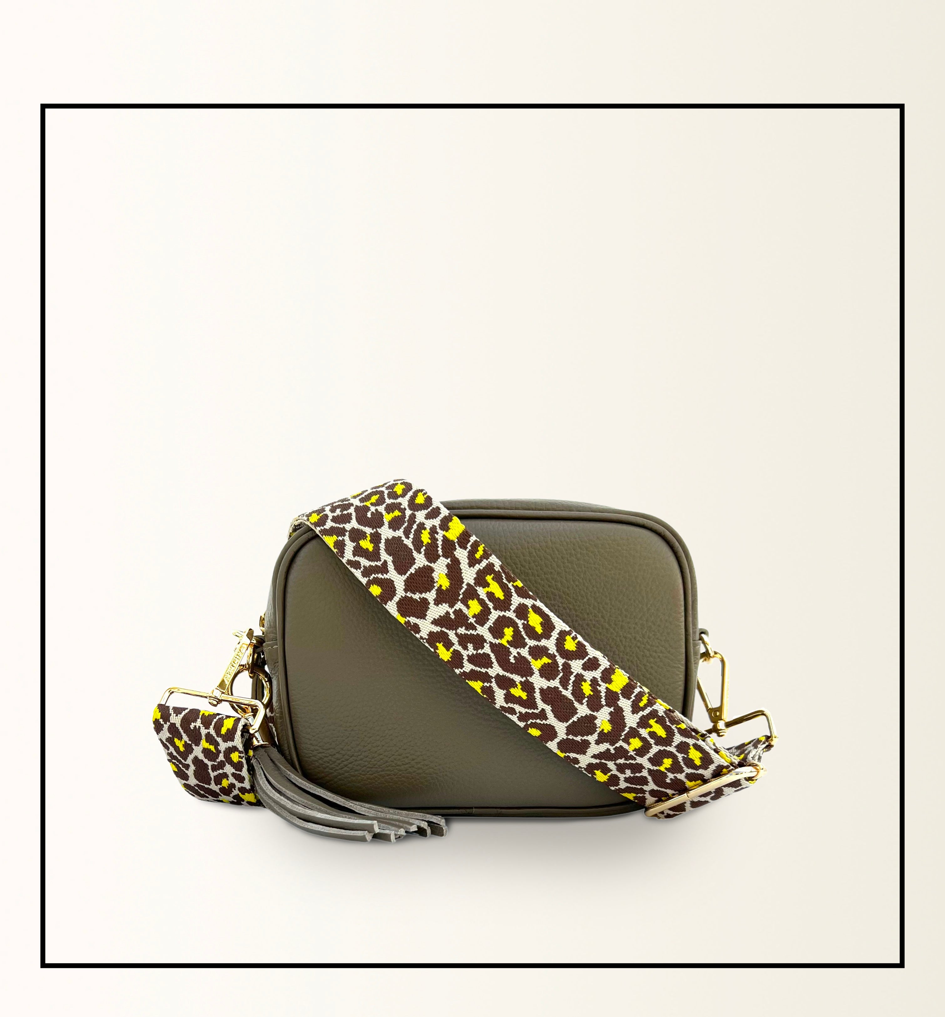 The Tassel Latte Leather Crossbody Bag With Lemon Cheetah Strap
