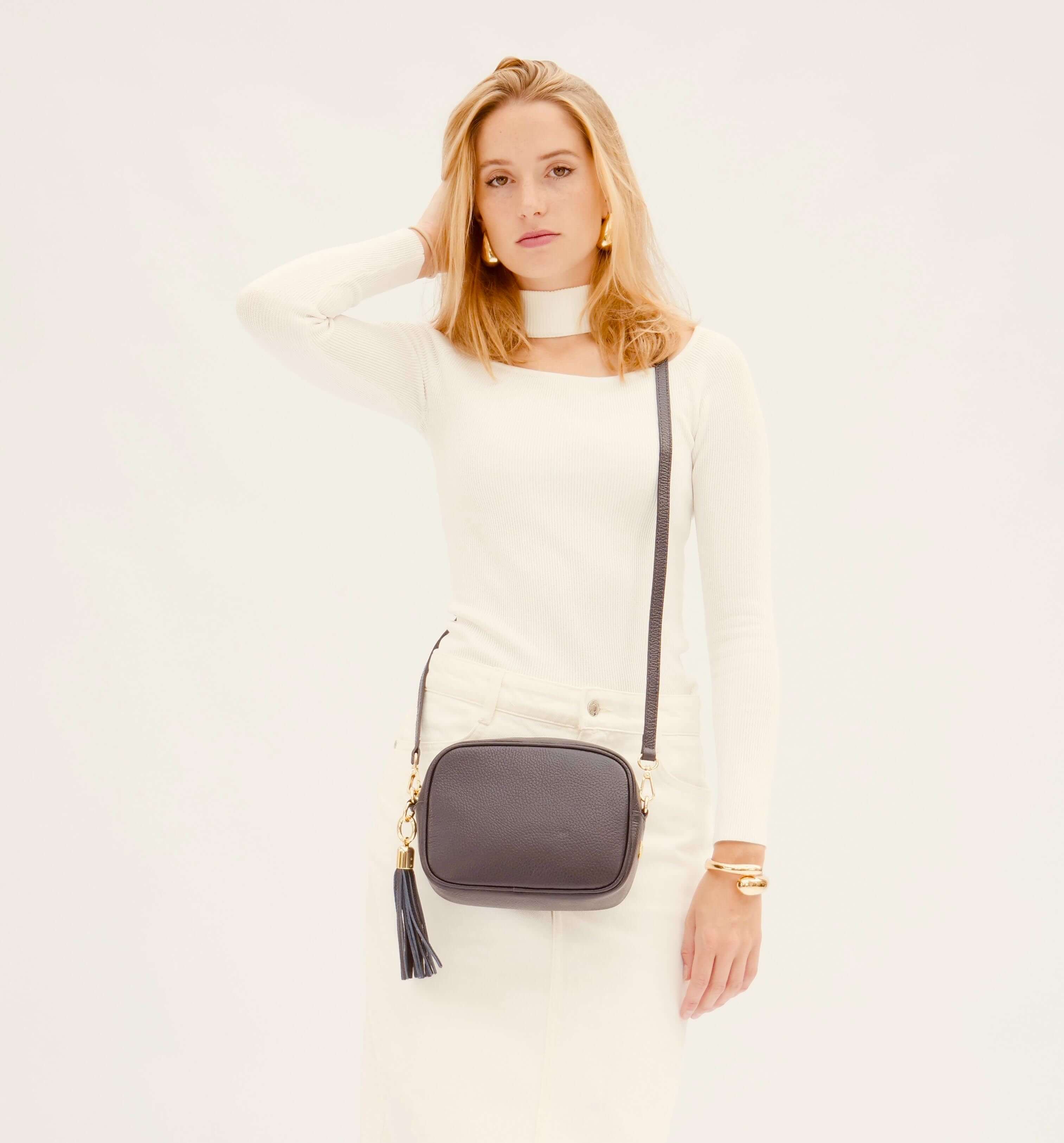 The Tassel Navy Leather Crossbody Bag With Olive Green Cheetah Strap