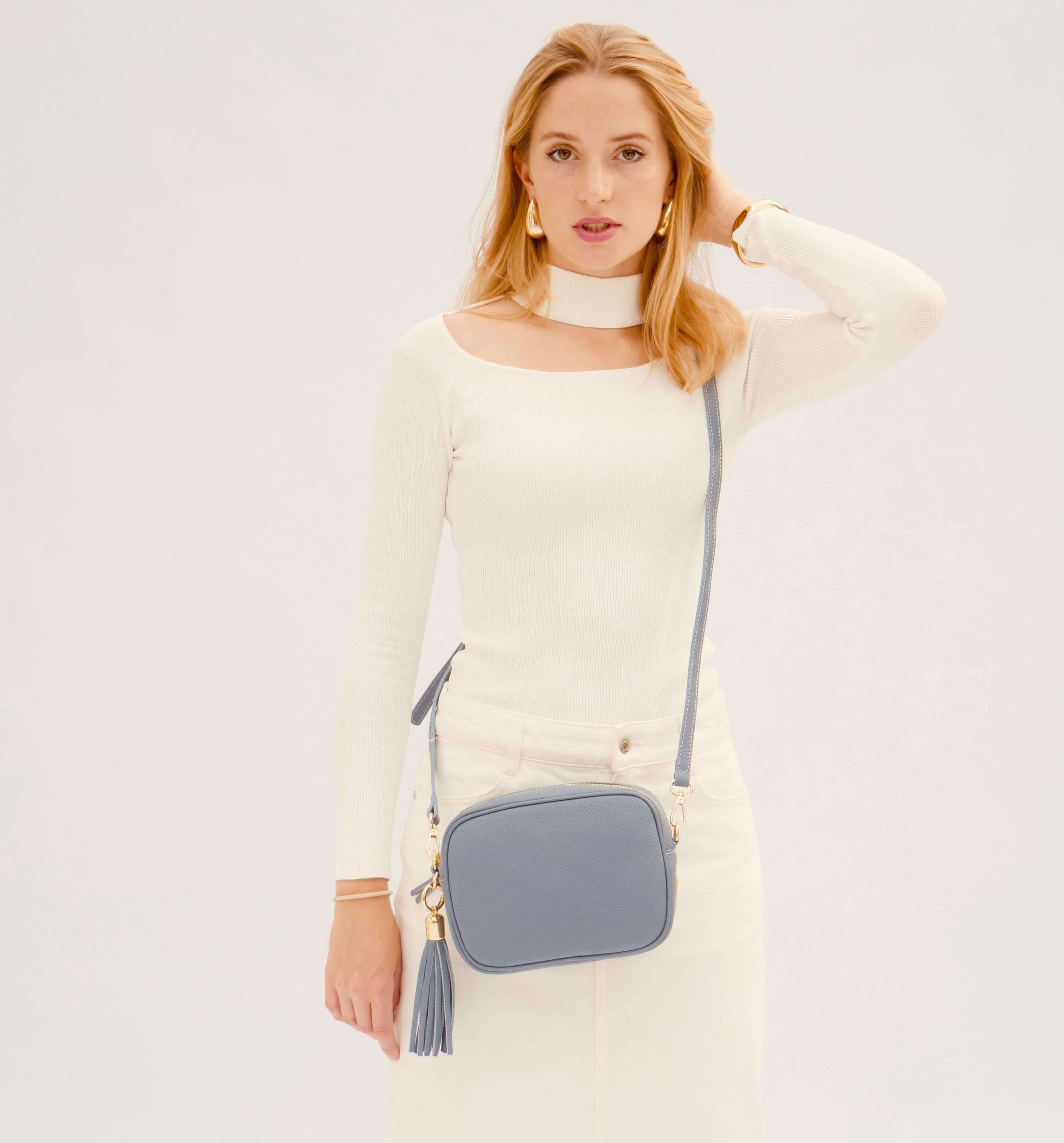 The Tassel Denim Blue Leather Crossbody Bag With Gold Chain Strap