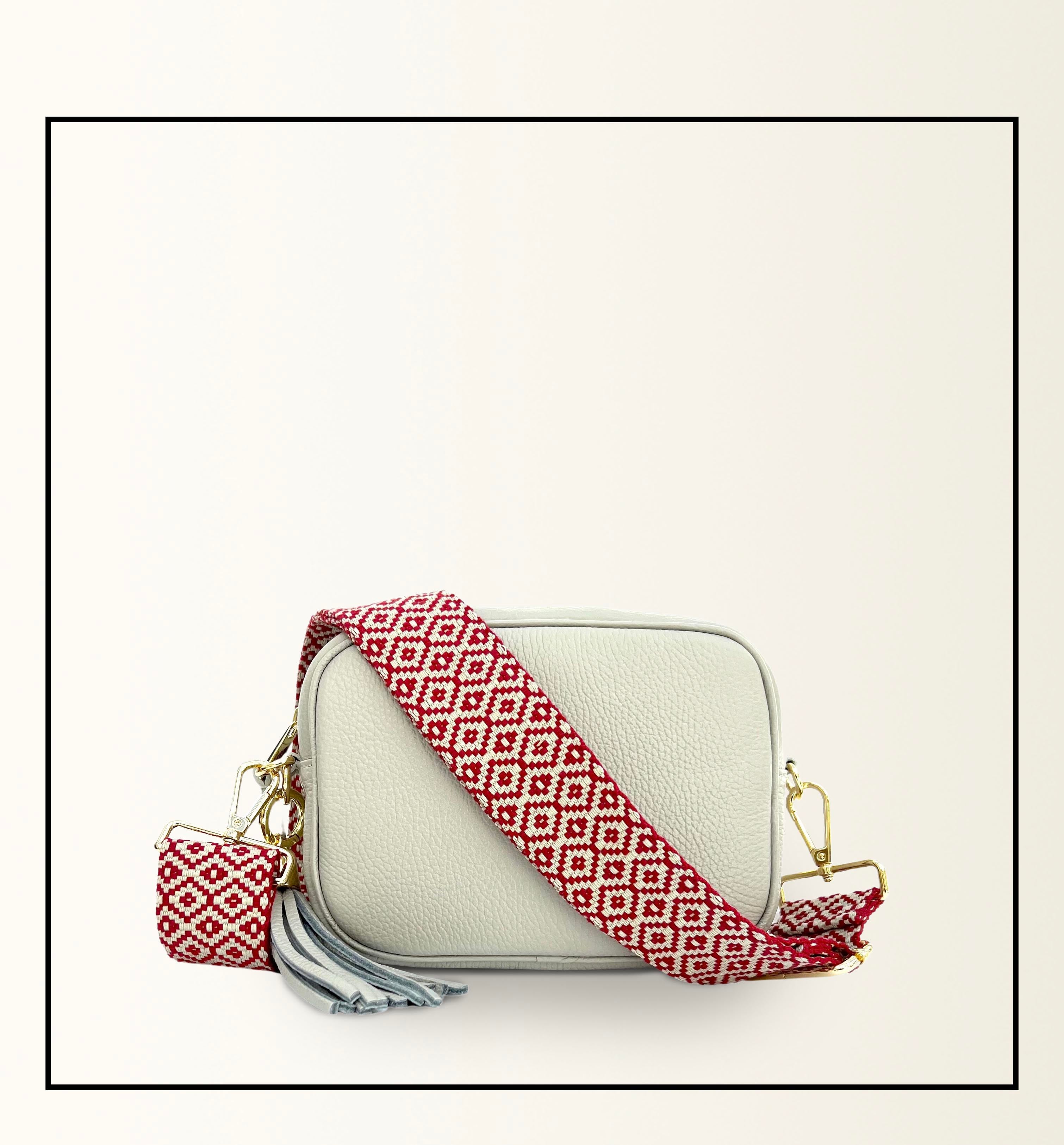 The Tassel Light Grey Leather Crossbody Bag With Red Cross-Stitch Strap
