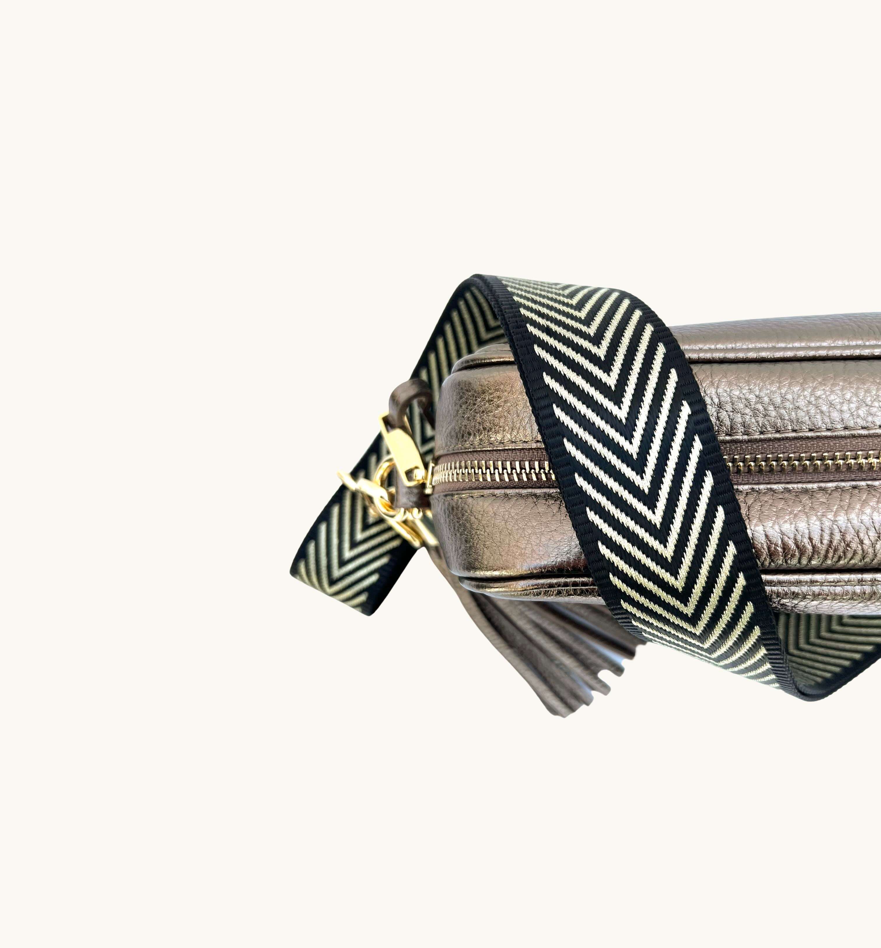 The Tassel Bronze Leather Crossbody Bag With Black & Gold Chevron Strap