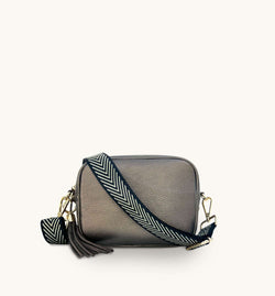 The Tassel Bronze Leather Crossbody Bag With Black & Gold Chevron Strap
