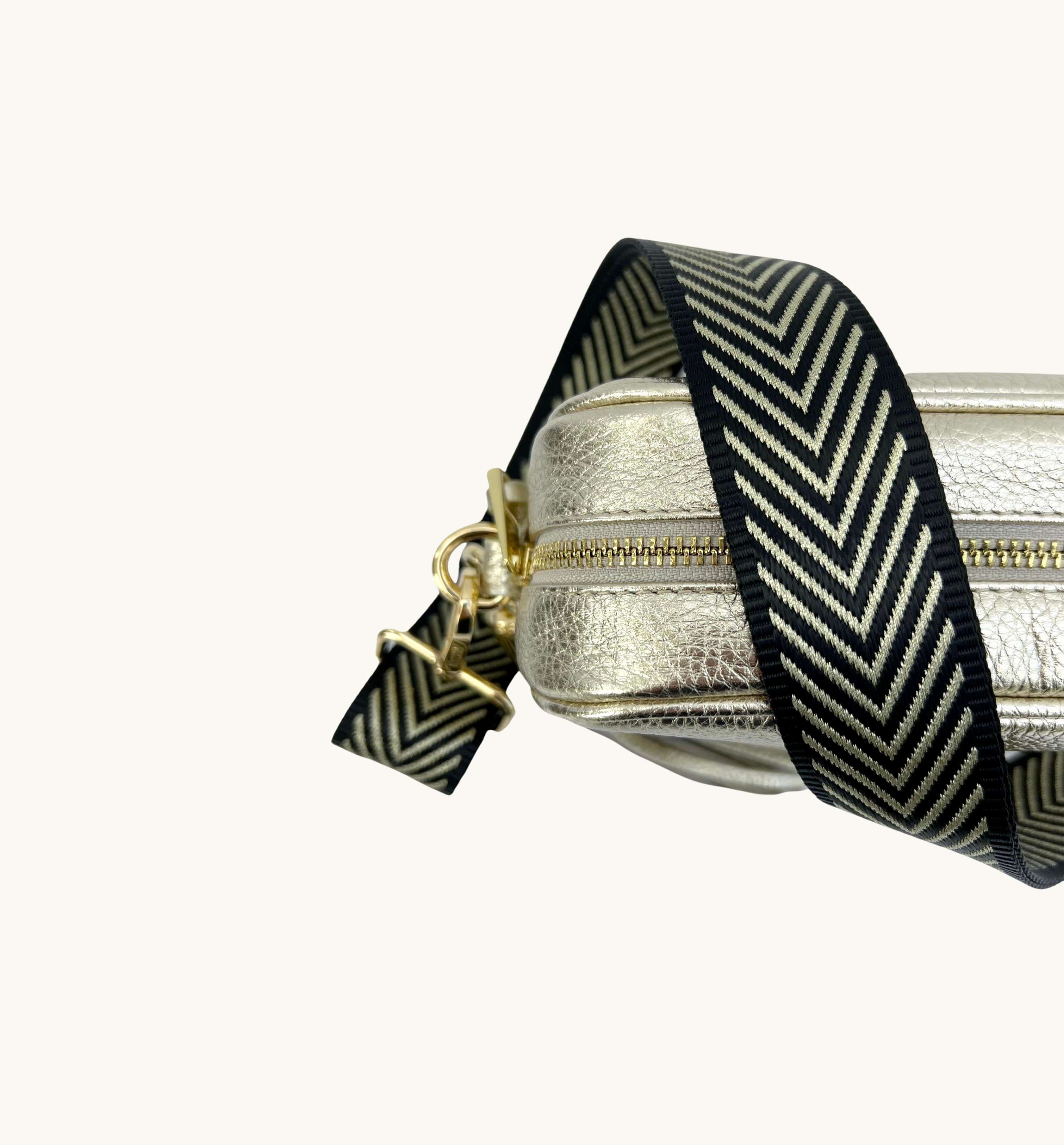 The Tassel Gold Leather Crossbody Bag With Black & Gold Chevron Strap