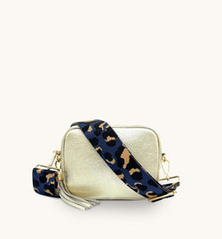 The Tassel Gold Leather Crossbody Bag With Navy Leopard Strap