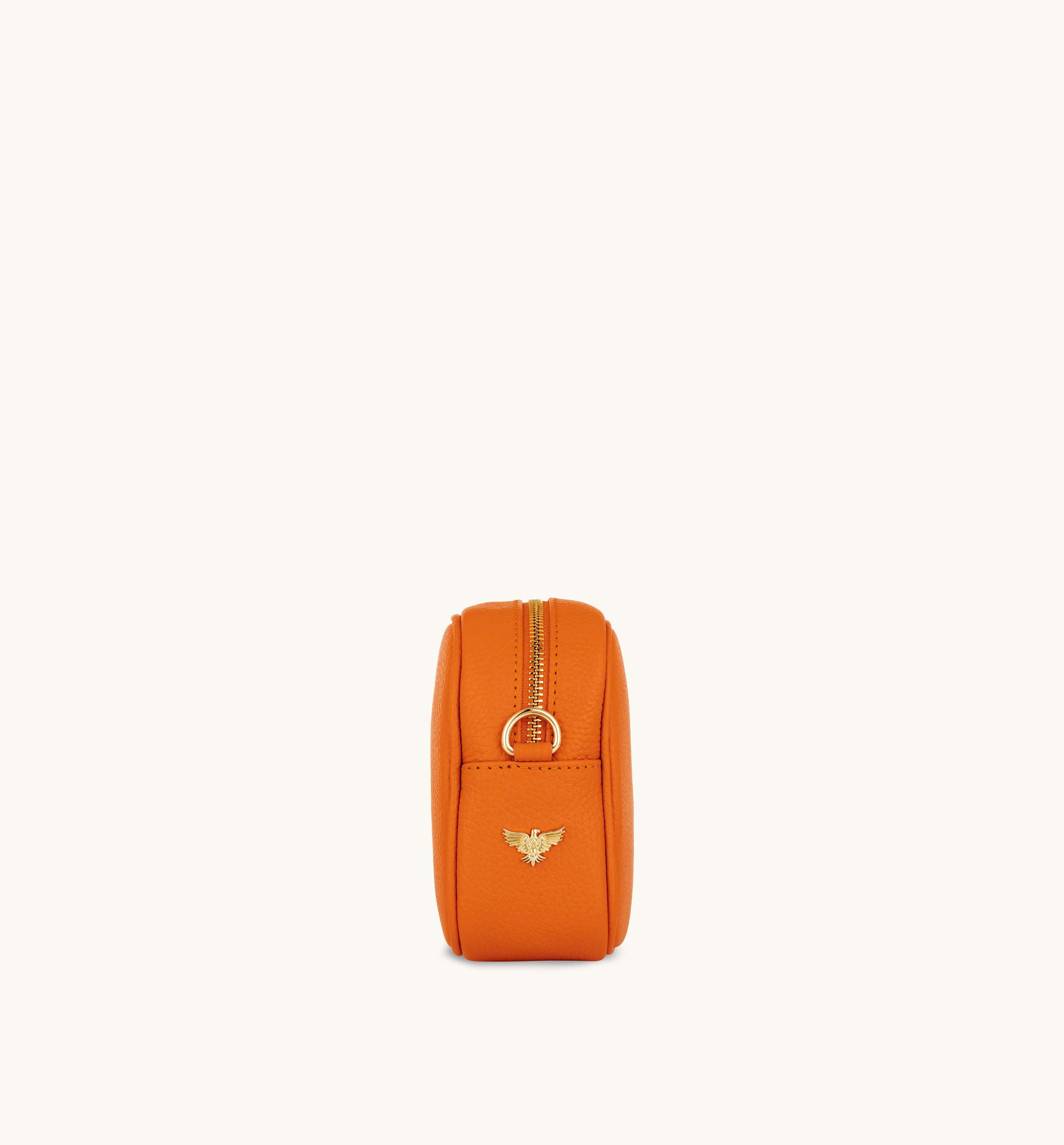 The Tassel Orange Leather Crossbody Bag With Orange Cross-Stitch Strap