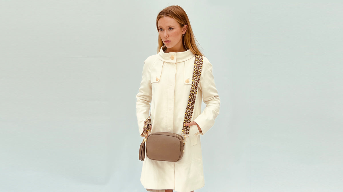 The Tassel Latte Leather Crossbody Bag With Lemon Cheetah Strap