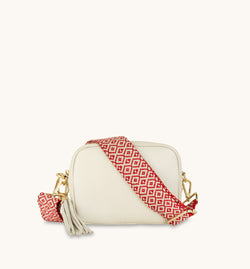 The Tassel Stone Leather Crossbody Bag With Red Cross-Stitch Strap