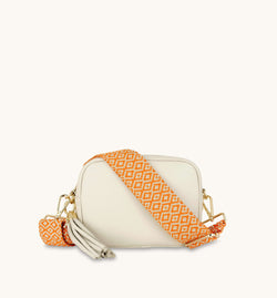The Tassel Stone Leather Crossbody Bag With Orange Cross-Stitch Strap