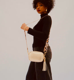 The Mini Tassel Gold Leather Phone Bag With Pale Pink Leopard Strap