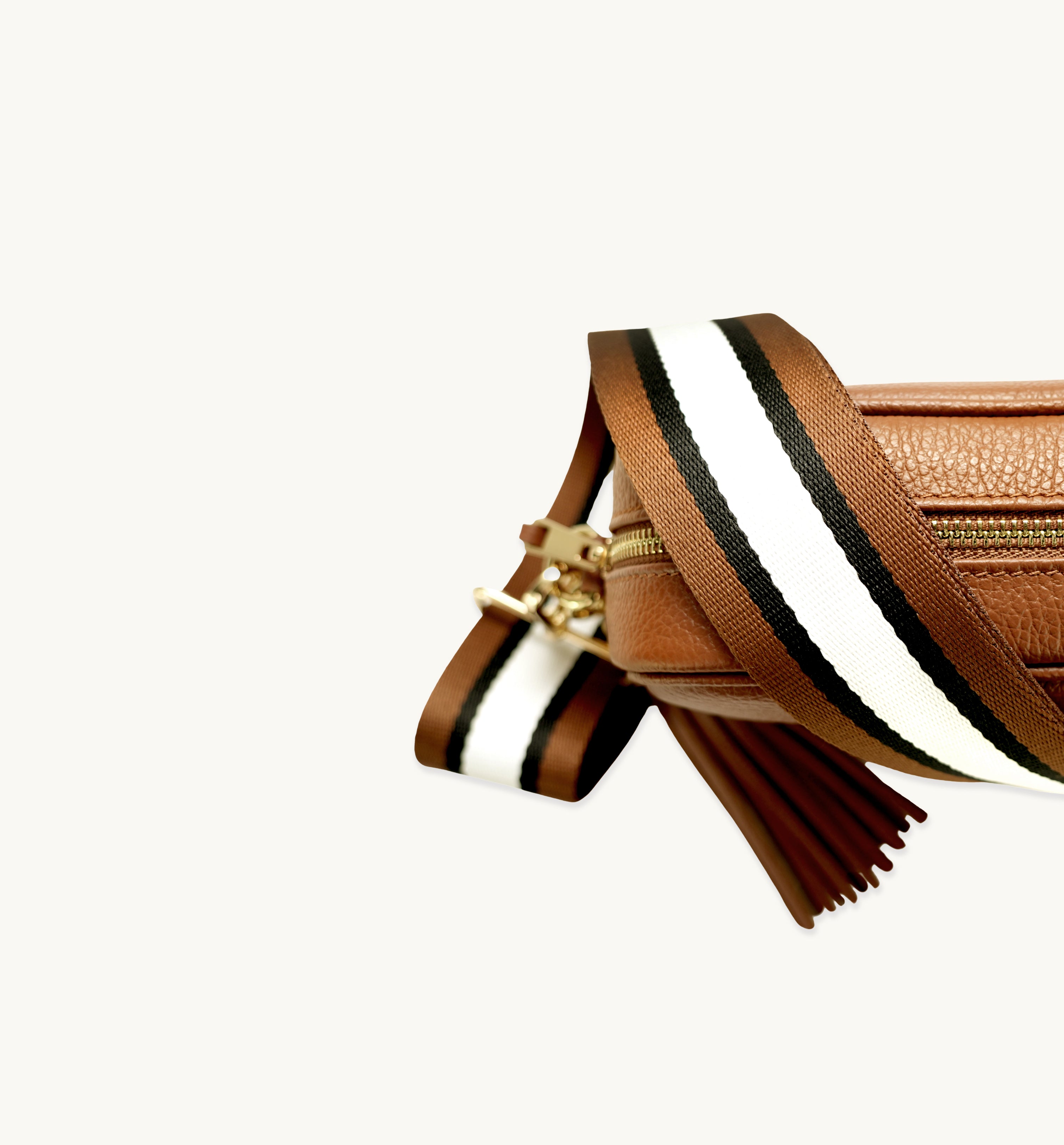 The Tassel Tan Leather Crossbody Bag With Tan Stripe Strap