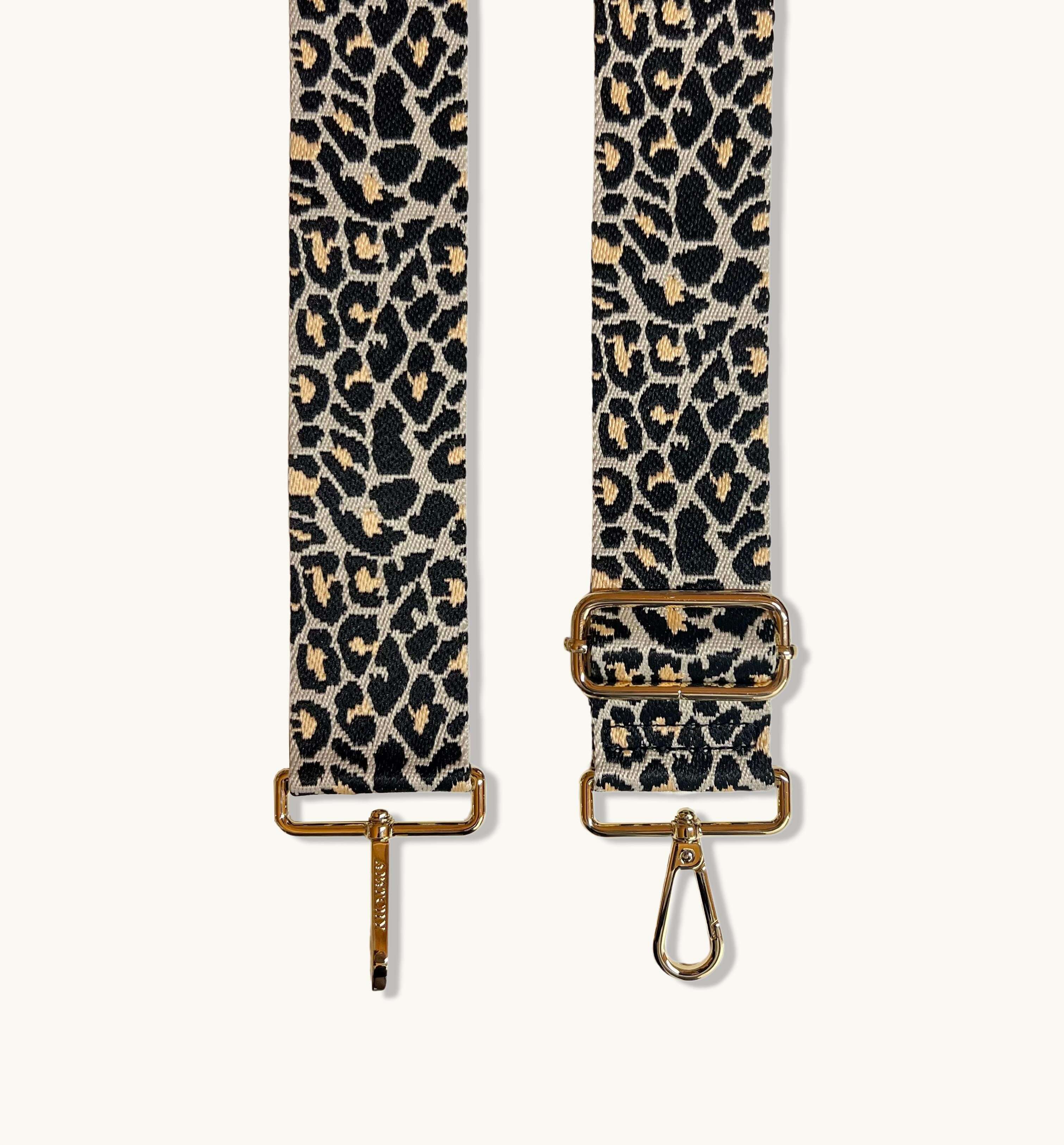 The Mini Tassel Black Leather Phone Bag With Apricot Cheetah Strap