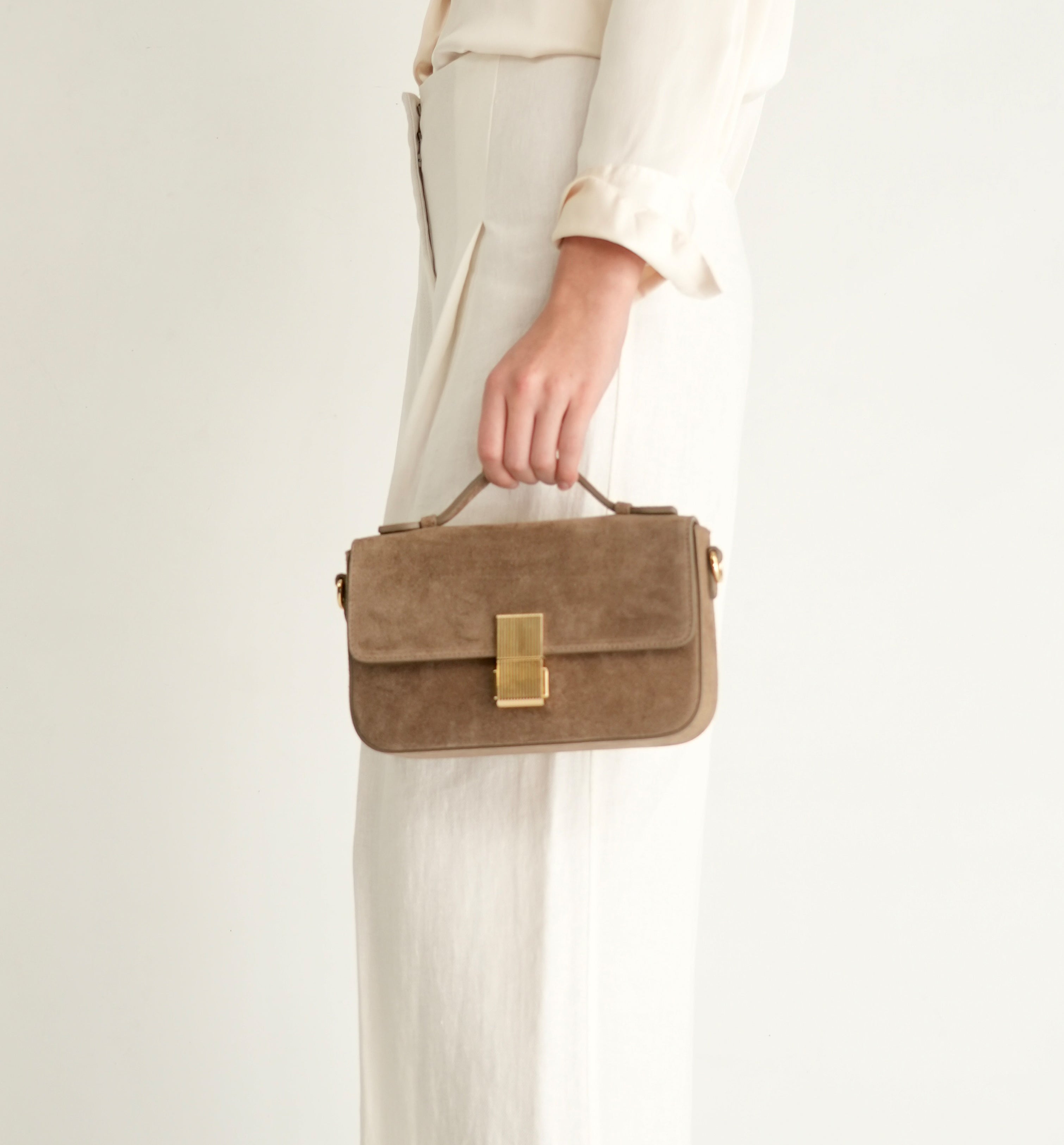 The Flora Top Handle Suede Bag