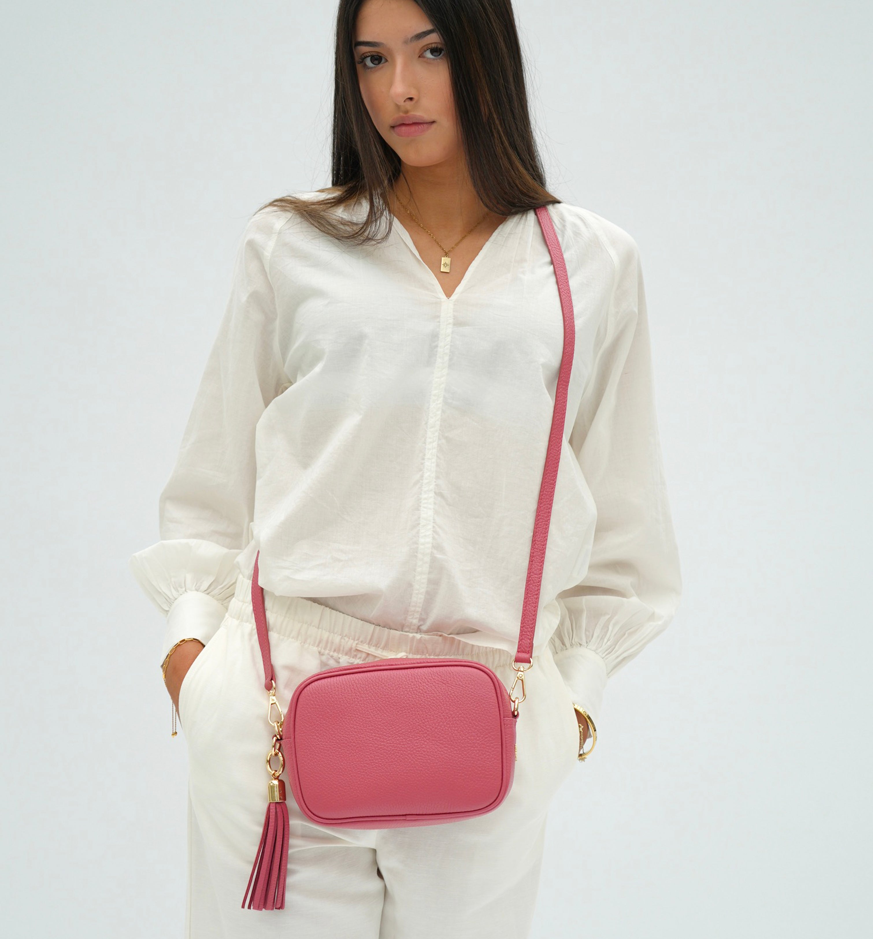 The Tassel Raspberry Leather Crossbody Bag