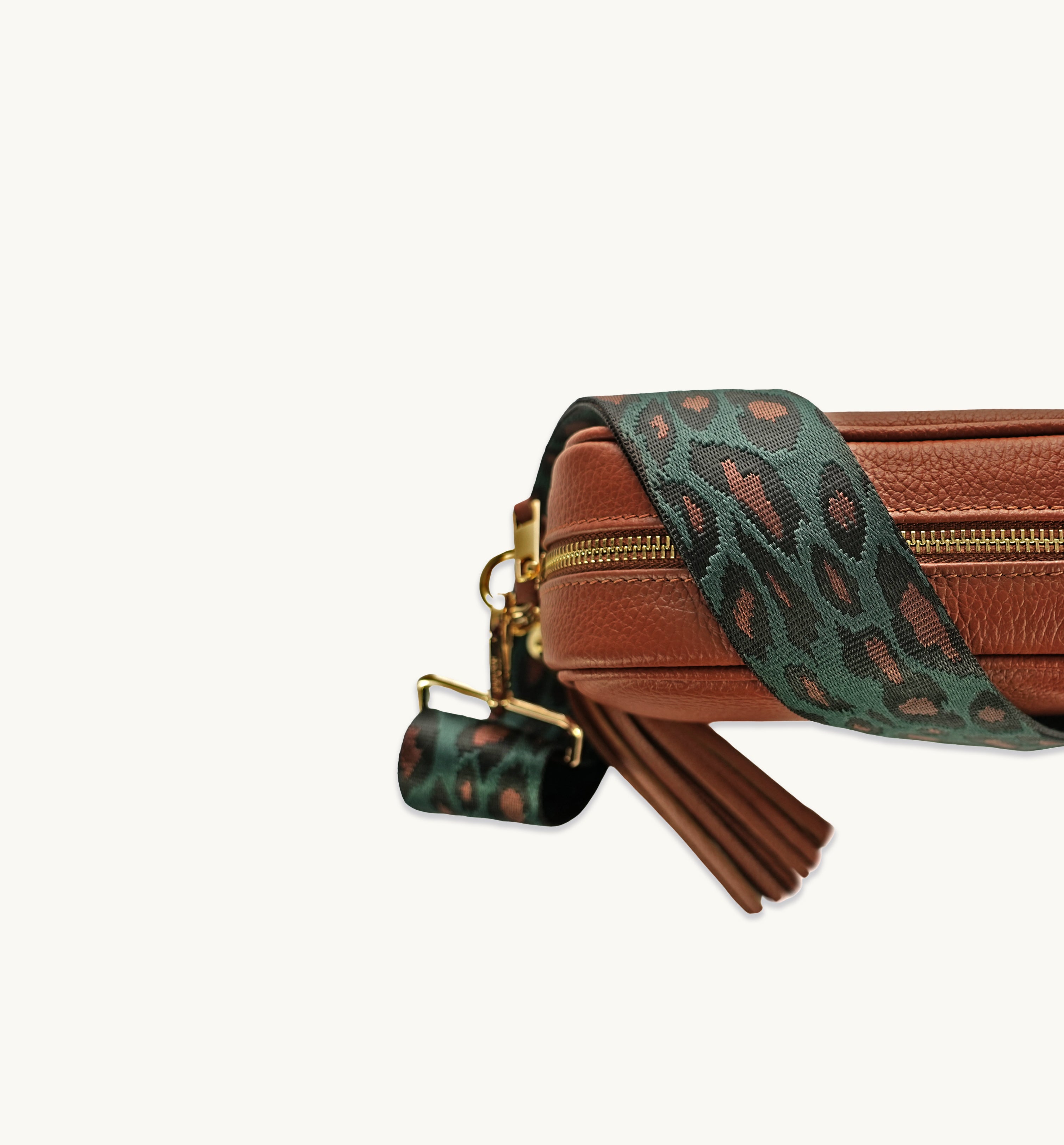 The Tassel Tan Leather Crossbody Bag With Teal Cheetah Strap