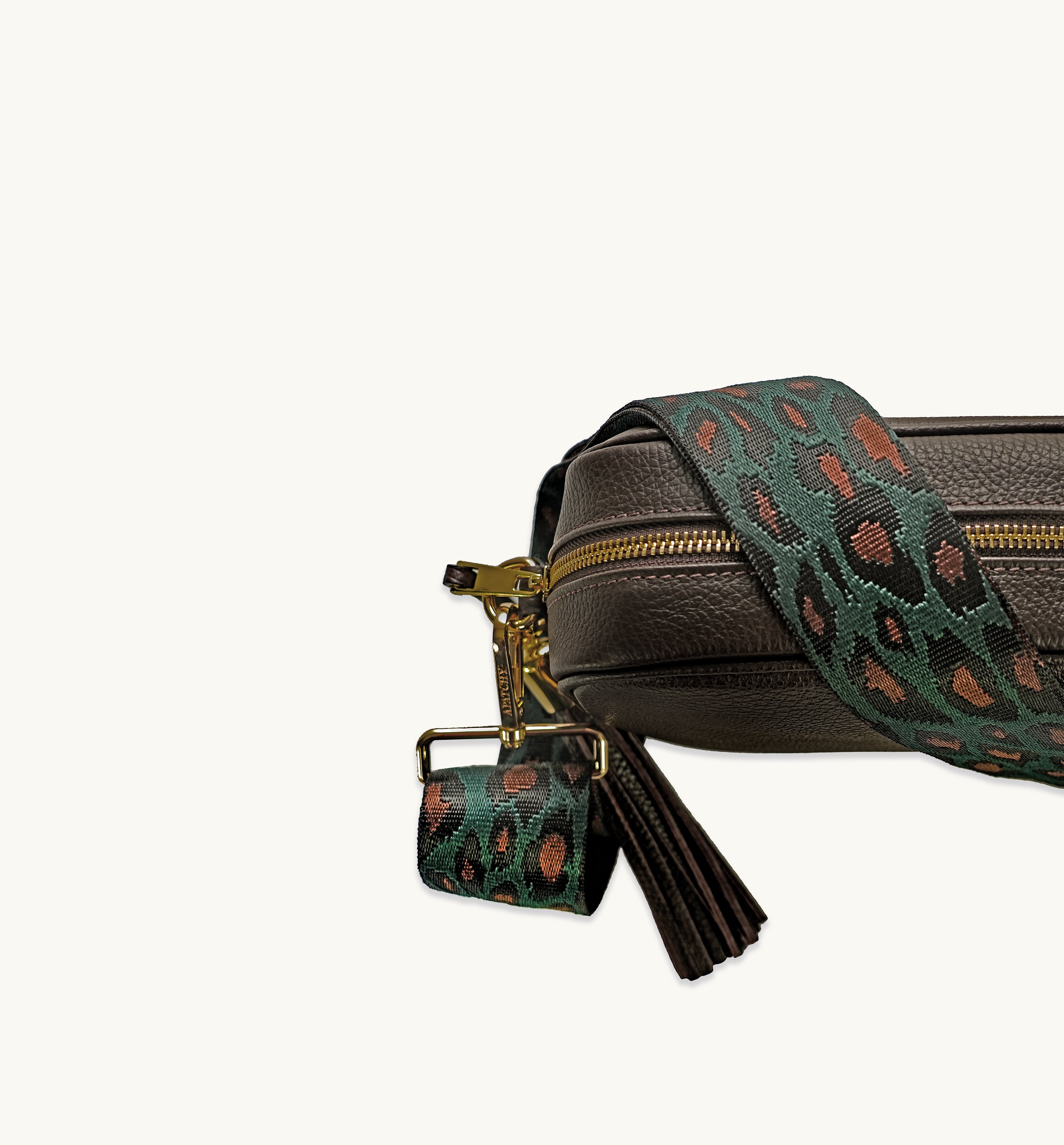 The Tassel Leather Crossbody Bag With Teal Cheetah Strap