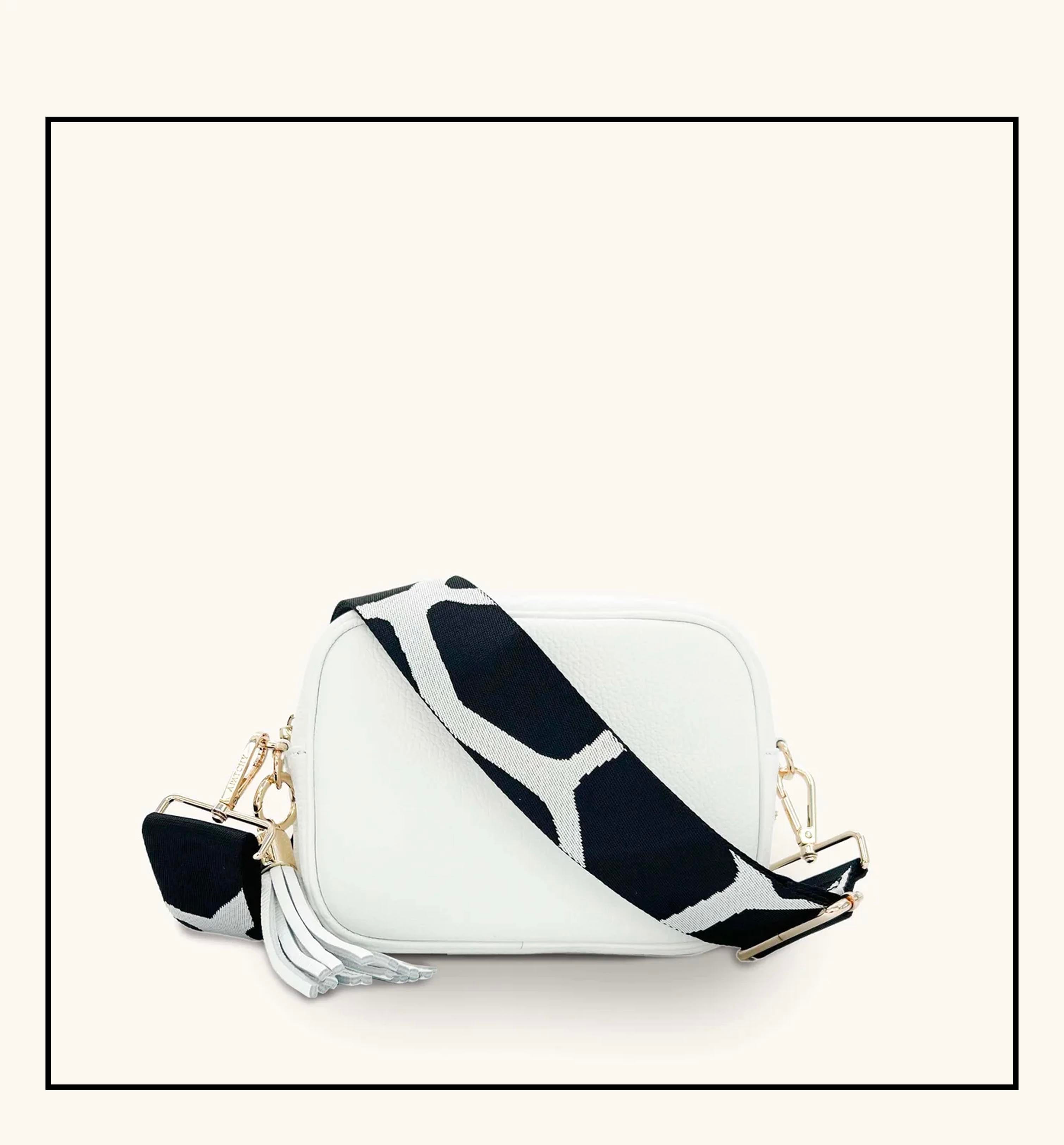 The Tassel White Leather Crossbody Bag With Black & White Giraffe Strap