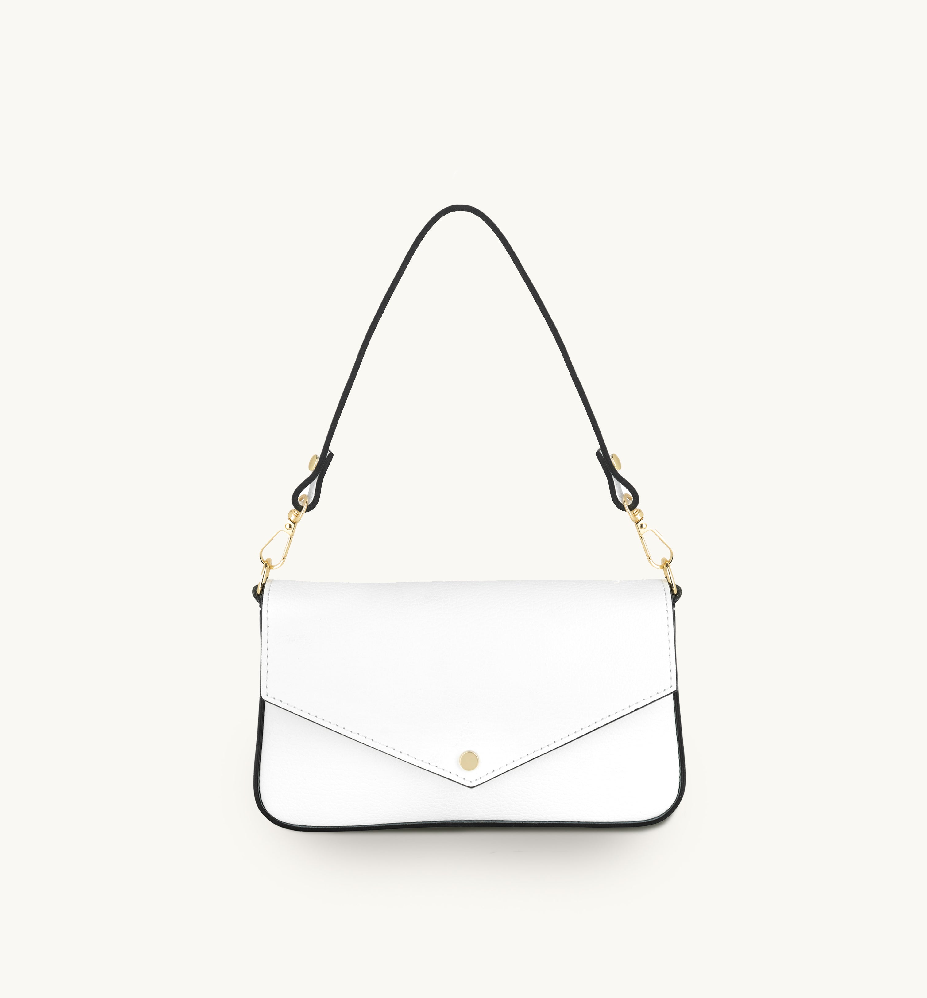 White handbag with gold accents on a white background
