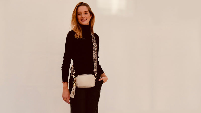 The Mini Tassel Light Grey Leather Phone Bag With Neon Pink Cross-Stitch Strap