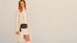 The Mini Tassel Navy Leather Phone Bag With Navy Leopard Strap