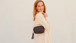 The Mini Tassel Navy Leather Phone Bag With Gold Chain Crossbody Strap